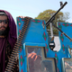 A Taliban fighter poses in front of the U.S. Embassy in Kabul during a celebration marking the first anniversary of the withdrawal of US-led troops from Afghanistan.